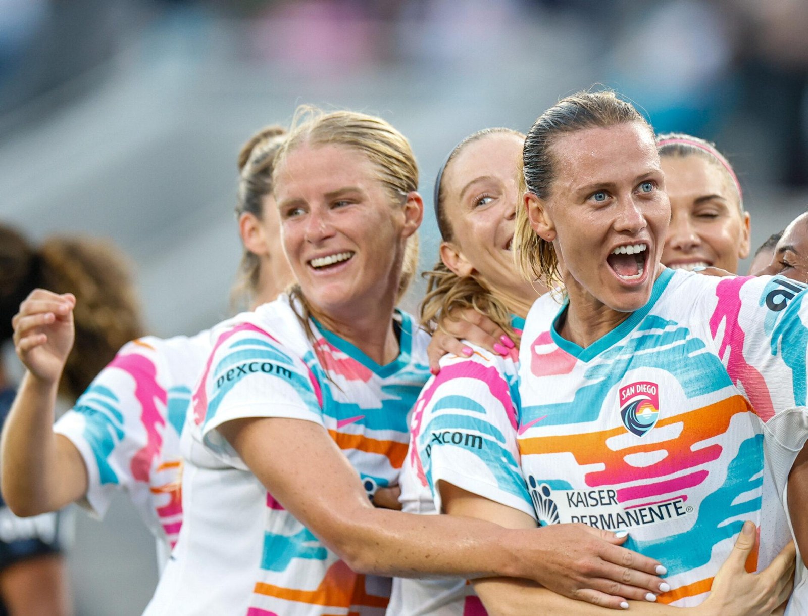 Players celebrating together after a World Sevens Football goal