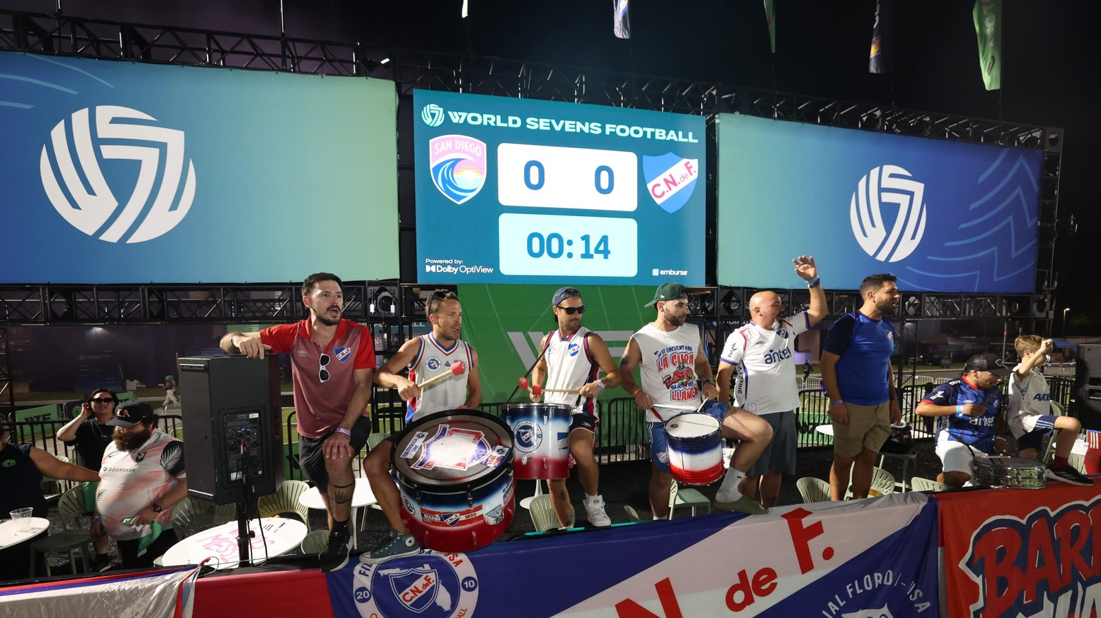 Supporter group drumming on the goal line party deck at World Sevens Football